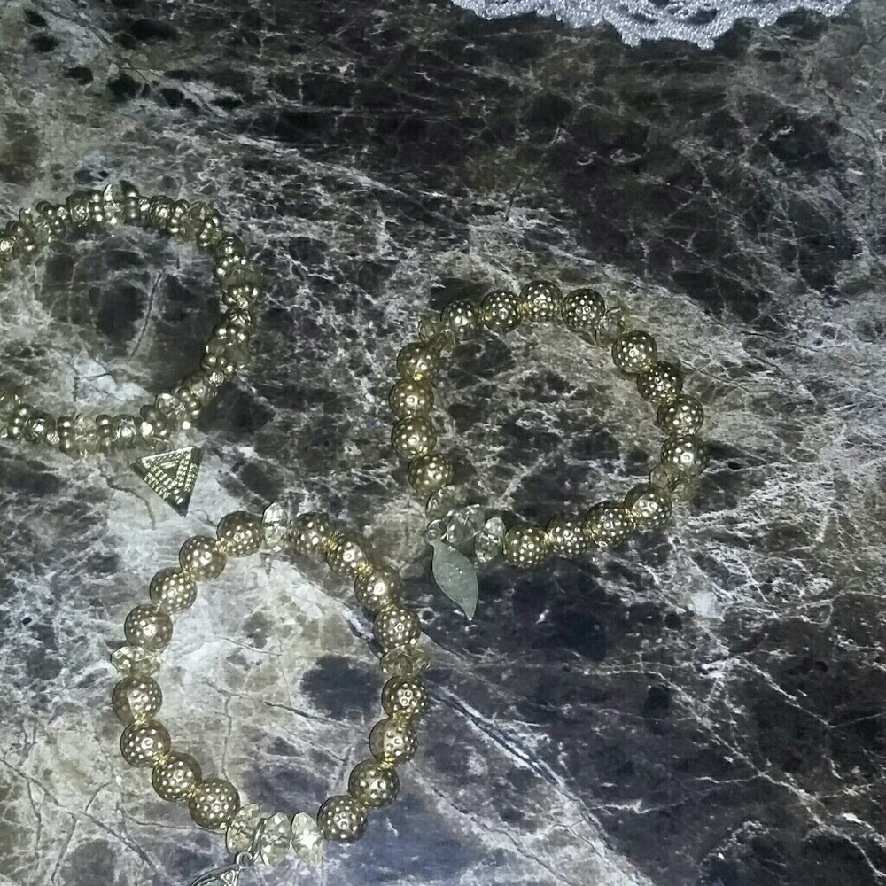 A pair of b bracelets